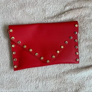 Red clutch with gold studs